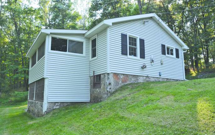 Stillwater murder suspect told police that victim was a child molester Dennis Pegg's house on Millbrook Road in Stillwater.