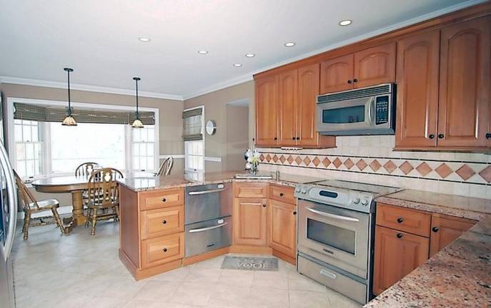Spacious center hall colonial has in-ground pool Spacious center hall colonial has in-ground pool