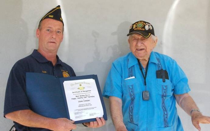 Post Commander Rob Lawler (left) presents former Post Commander and World War II veteran John Yanish with one of several certificates acknowledging his service to his country and community. (Photo by Chris Wyman)