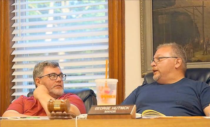 Councilman Michael Nardini (left) and Mayor George Hutnick discuss Heater’s Pond (Photo by Vera Olinski)