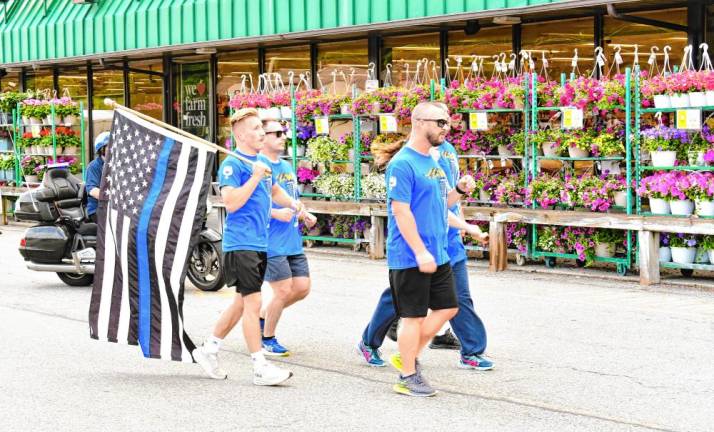 Photos: Special Olympics Torch Run The runners take a break at ShopRite in Franklin.