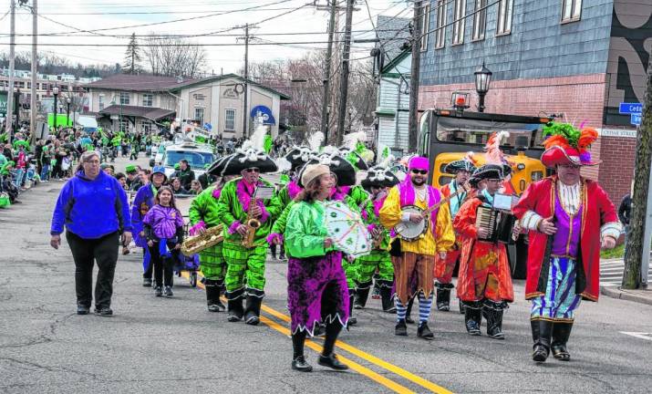 The Jersey String Band marches in the parade.