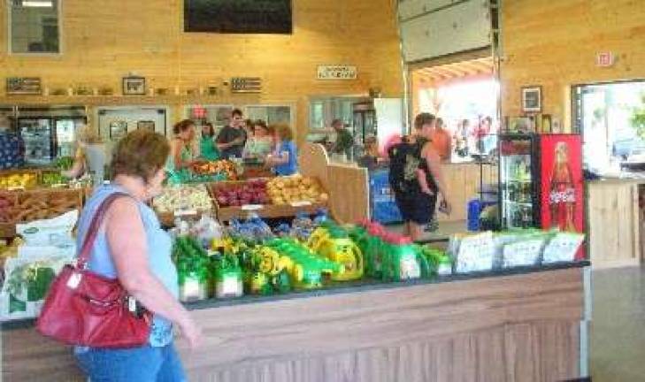 Tranquillity Farms opens new store Customers browse the selection at the new Tranquillity Farms Market and Garden Center.
