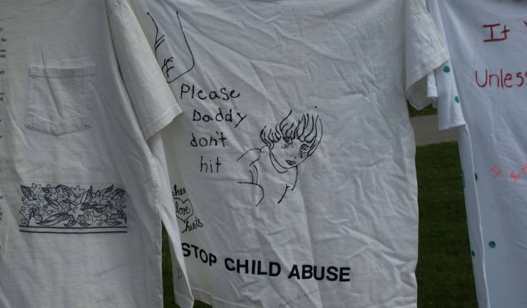 The shirts tell the tale T-shirts made by domestic and sexual assault victims hang in the Newton Green Wednesday.