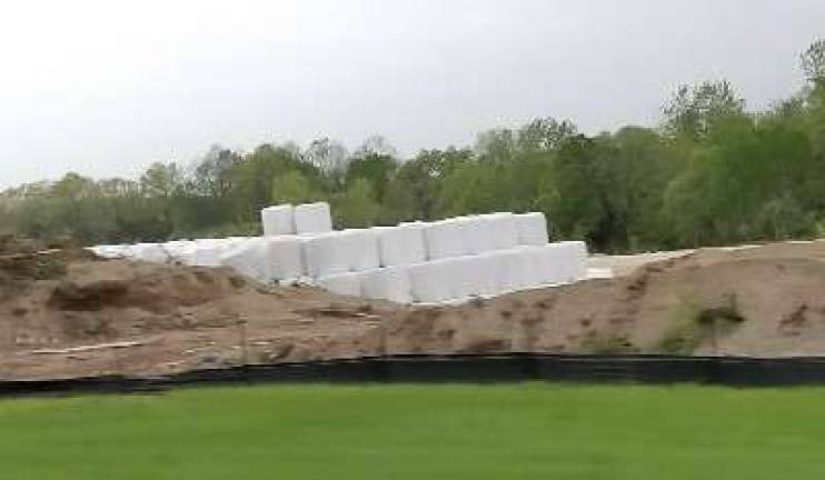 Construction begins on glass recycling facility Bales of recycled glass materials rest on the site of future Pace Glass Recycling, Inc. processing facility on Limecrest Road