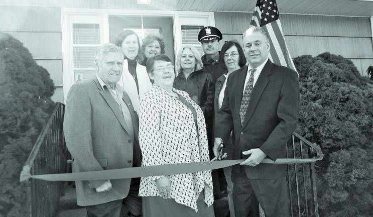Accounting firm comes to Andover First row, from left: Don and Linda Daniels and Andover Township Mayor Michael Lensak. Back row, from left: Office Manager Sharon Stewart, Realtor Joanne Kanouse, Andover Township Deputy Clerk Jackie Huelbig, Andover Police Chief Gil Taglialatela and business colleague Maryann Klenke.