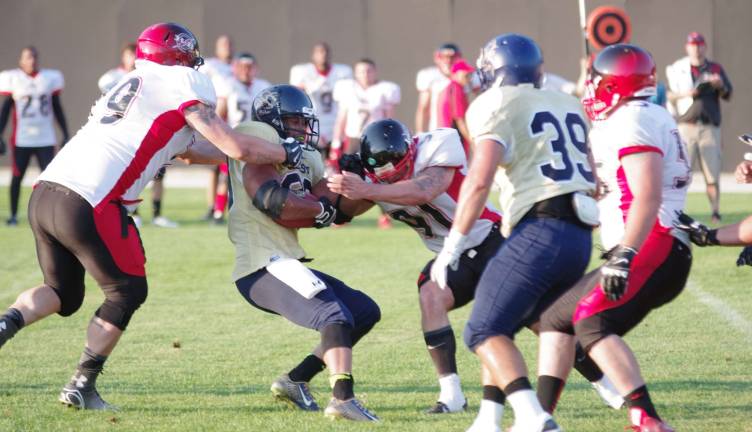 Sussex Stags lose season opener Sussex Stags running back Raheem Ridley gets caught behind the line of scrimmage by the Watertown Red & Black.
