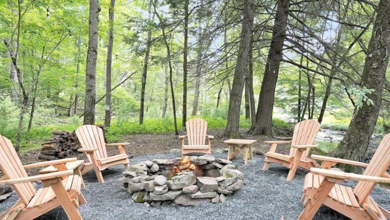 Modern three-bedroom ranch on Raymondskill Creek Fire pit