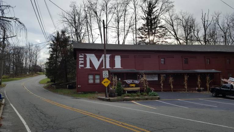 The Mill's new signage was painted right onto the building, as signage was done in years gone by.