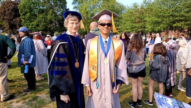 SCCC grad is only 15 Sussex County Community College president Jon Connolly, left, poses with Ty Lewis, 15, of Hamburg after graduation May 17. Ty earned an associate’s degree in computer science and mathematics. (Photo provided)