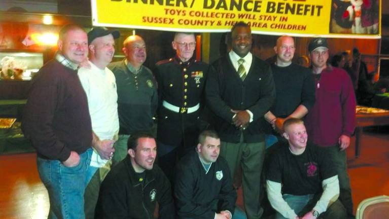 Andover F.O.P's Toys for Tots a success Back row from left: Rod Mosner, Eric Danielson, Gil Taglialatela, Kenneth Eschenbach, Lee Rouson, Rich Then, Jason Mills. Front row from right: Bob Youngs, Brian Kithcart, Dan Kern.