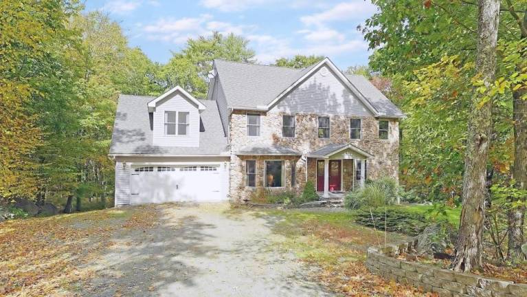 Custom-built colonial has room to spare