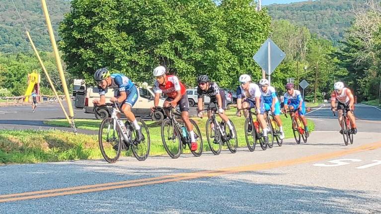 18th annual Giro del Cielo Road Race Seven cyclists lead in the Men 123 category of the Giro del Cielo Road Race on Sunday morning, July 14 in Branchville. In that category, for the fastest riders, the cyclists were repeating the 8.8-mile loop course seven times for a total of about 57 miles. (Photos by Kathy Shwiff)