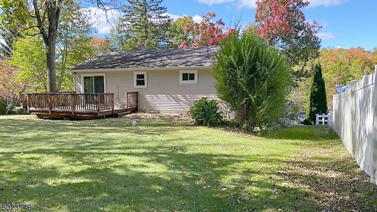 Homey ranch is nestled on picturesque property near many recreational activities