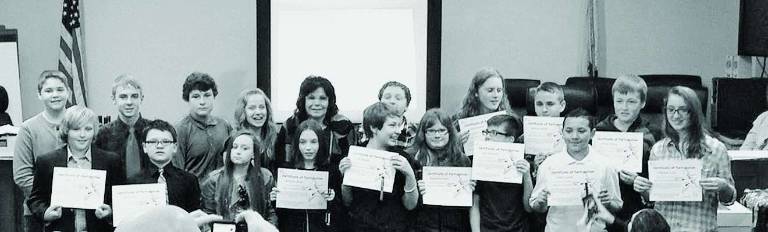Students honored during town hall meeting Hopatcong students honored at the meeting for their PSA entries with Hopatcong Mayor Sylvia Petillo.