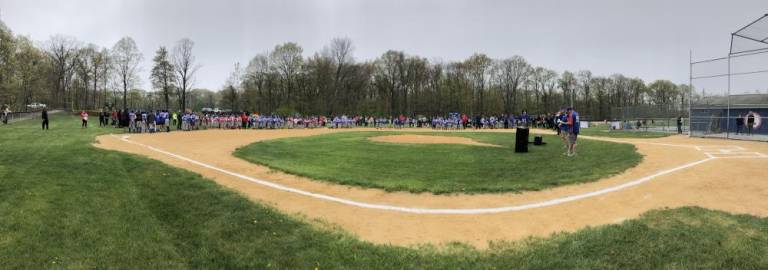 Lakeland Little League teams line up around the diamond on opening day in Stanhope.