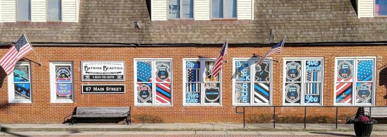 Original paintings honor police officers Kim Lonsky's work at Bathing Beauties (Photo provided)