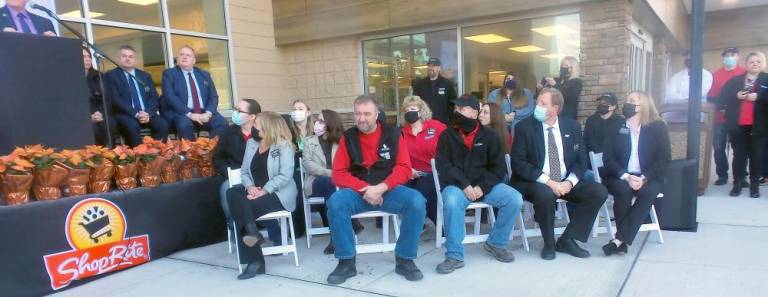 Top management and local associates gave speeches during the grand opening (Photo by Frances Ruth Harris)