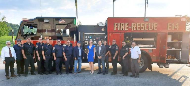 Hardyston celebrates arrival of new fire engine, which gets put to use right away From left: Deputy Mayor Frank Cicerale, firefighter Frank Lacatena, Lieutenant Adam Paz, Assistant Chief Stu Cohen, Assistant Chief Anthony Rosta, President Ray Marion, Vice President John Gianonne, Mayor Brian Kaminski, Township Manager Carrine Piccolo-Kaufer, Councilman Santo Verrillo, firefighter Derek Watson, firefighter Joe Ionta Sr., firefighter Michael Palmer, and Councilman Carl Miller (Photo by Laura Marchese)