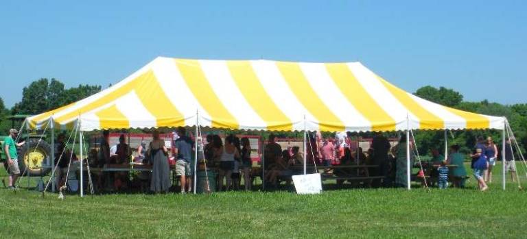 Tranquillity Farms opens new store Patrons beat the heat and enjoyed concessions under the big tent
