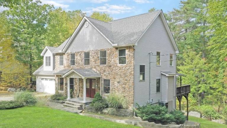 Custom-built colonial has room to spare
