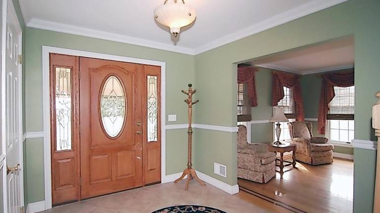 Spacious center hall colonial has in-ground pool Spacious center hall colonial has in-ground pool