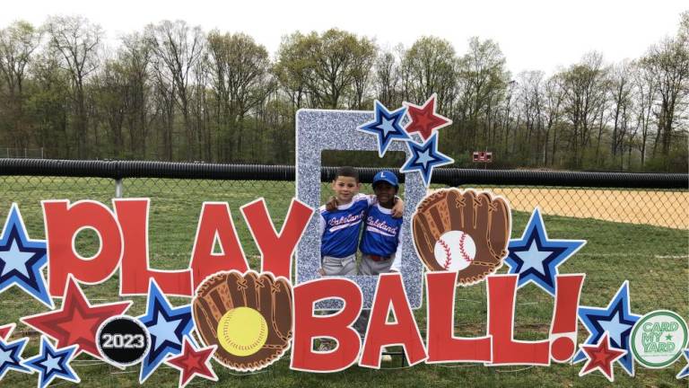 Canice Wall Jr., left, and Braxton Turner pose for a photo on opening day. Both are 7 and live in Netcong. This is their second year playing on a Lakeland Little League team.