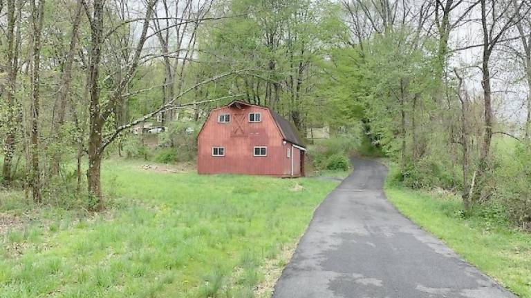 Colonial on 8.5 acres includes horse barn