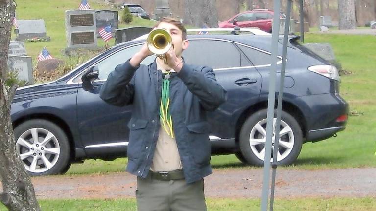 Bugler Alex McCann played Taps (Photo by Janet Redyke)