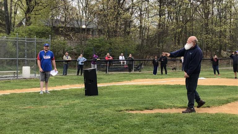 Netcong Mayor Joseph Nametko throws out a first pitch.