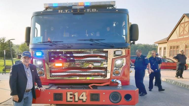 Hardyston celebrates arrival of new fire engine, which gets put to use right away Hardyston Mayor Brian Kaminski in front of the new Rosenbauer fire engine (Photo by Laura Marchese)