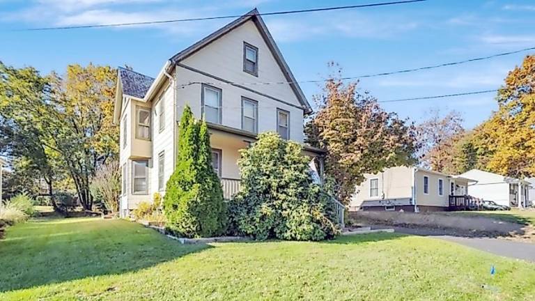 Details and finishes set this spacious colonial apart