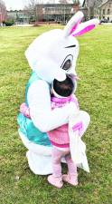 <b>Everleigh Shane hugs the Easter Bunny.</b>
