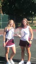 Eve Sylvester and Olivia Martin serve as Newton's senior captains of the girls' tennis team.