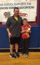 Jump Rope for heart coordinator Mike Kulea, left, with this year’s top fundraiser, Jayden Apolinaro, who has raised over $1,000 two years in a row. Jayden was born with a congenital heart defect and has done an amazing job promoting the mission of the American Heart Association.