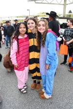 Nillen Gutierrez, Harper Brady and Callie Howard are shown at the Byram school trunk or treat.