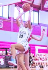 <b>Wallkill Valley's Jordyn Trinkleback (20) leaps during a shot. Trinkleback scored 12 points.</b>