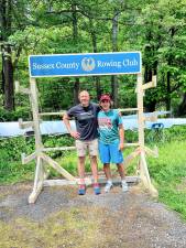 Mike Crane, left, of Crane Carving with Andrew Wilson, who built a rack to store oars for the Sussex County Rowing Club as his Eagle Scout project. (Photo provided)