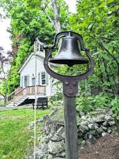 The restored school bell.