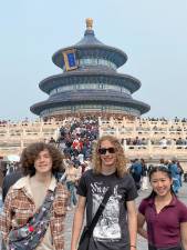 CH1 From left, Brett Meyer, Grayson Petrie and Gianna Baron in front of the Temple of Heaven in Beijing. (Photo provided)