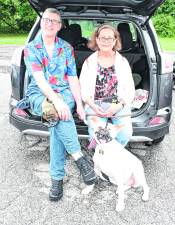 Stevef and Monica McKenzie of West Milford pose with their dog, Pepsi.