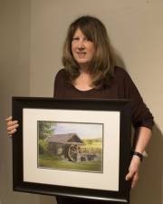 The artist with one of her creations Photo provided