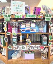 The new seed library is shown at the Louise Childs Library.