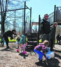 Children hunt for Easter eggs Sunday, March 24 in Musconetcong Park in Stanhope. More than 100 took part in the annual event, which was postponed from Saturday because of rain. (Photos by Maria Kovic)