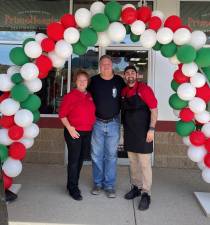 From left are Patty and Russ Babb and Drew Busa, co-owners of PrimoHoagies, which opened April 18 in Byram. (Photo provided)