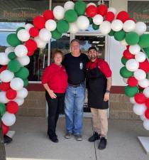 From left are Patty and Russ Babb and Drew Busa, co-owners of PrimoHoagies, which opened April 18 in Byram. (Photo provided)