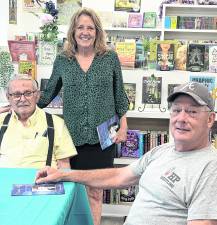<b>Pictured, from left, are author William Bathgate and book signing attendees Debbie Anderson and Mickey Thomas.</b>