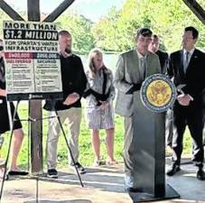 <b>The Sussex County commissioners are shown at an event highlighting improvements in Sparta’s water infrastructure.</b>