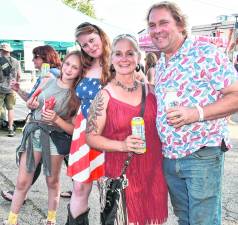 <b>Viola Judge, Kristy Zierenberg, Keri and Phil Brodhecker, all of Newton, pose for a photo.</b>