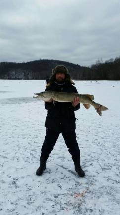 Tadeusz Koscien with one of his catches out on the ice